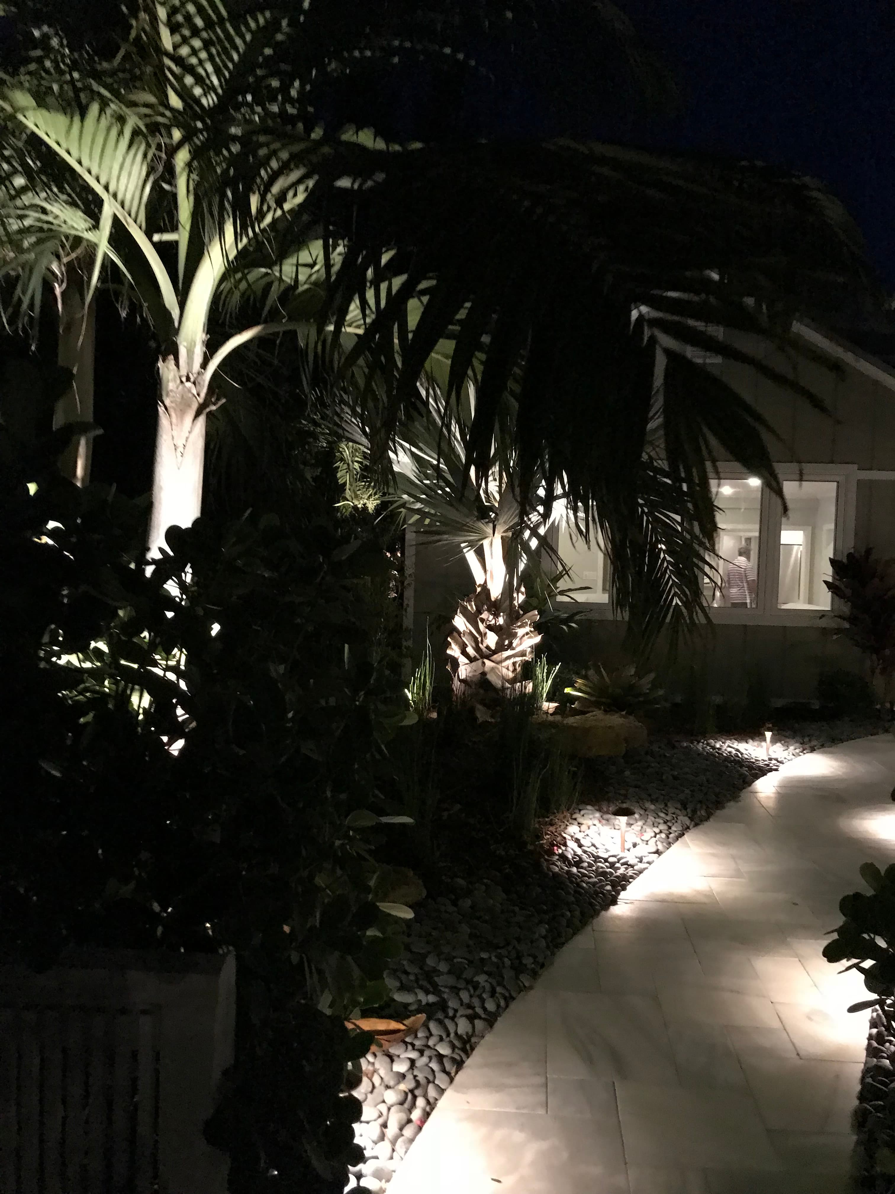 Solid brass pathway lighting installed on a Siesta Key waterfront estate